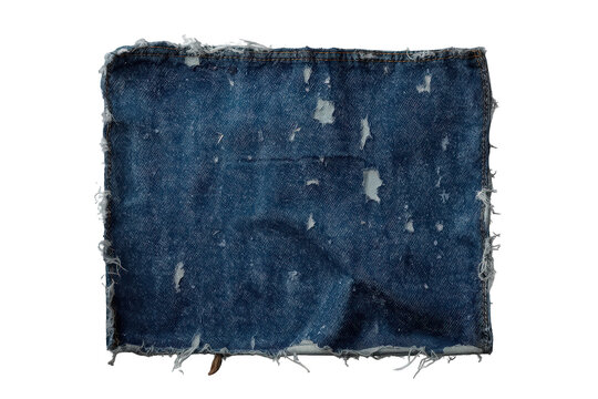 Distressed denim fabric patch with rough frayed edges, showing textile texture and peeling worn surface on transparent background