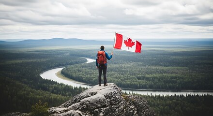 Obraz premium Labor day celebrations in canada a person holding canadian flag on a mountain peak