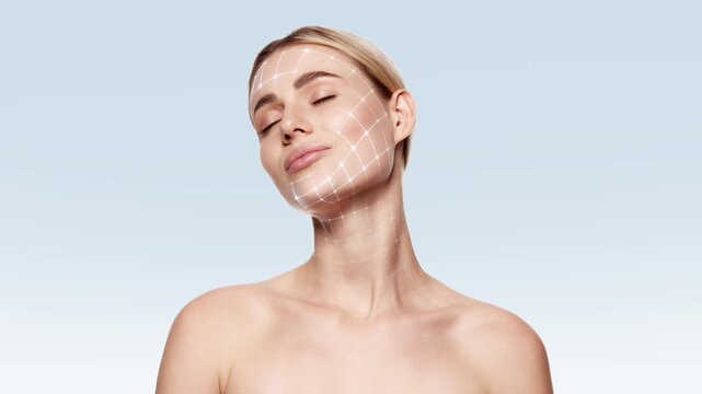 Woman with closed eyes and glowing facial grid mapping on clean background. Concept of digital skincare results, relaxation, spa treatment, anti aging effect and healthy radiant skin.