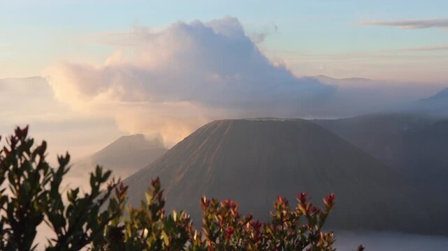 Gunung Batok Cinder Cone with Mount Bromo Eruption at Sunrise | King Kong Hill, East Java, Indonesia
