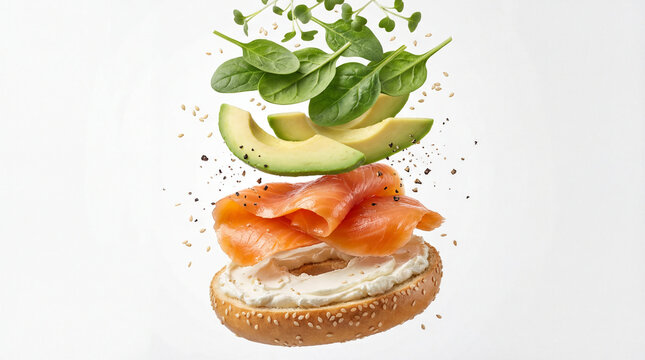 Bagel with salmon and avocado layers
