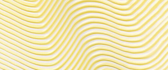 A close-up photo of a creamy texture, light yellow brushstroke, and graceful, smooth lines