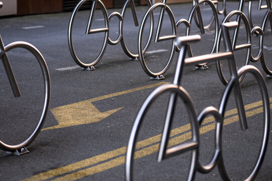 Bicycle parking rack on city street in Oslo Norway showing urban mobility infrastructure for commuting and secure bike storage