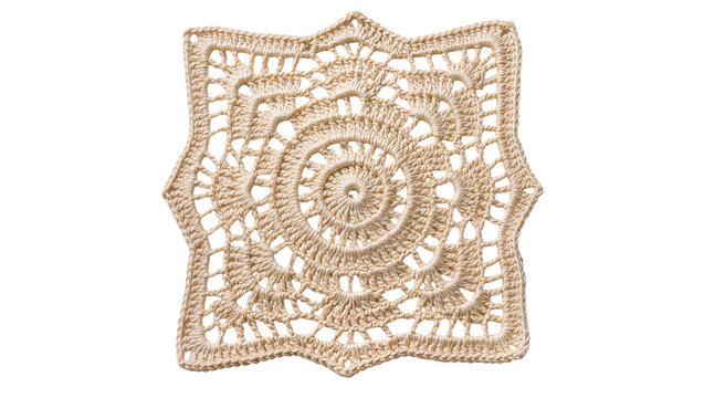 Isolated intricate beige crocheted doily with star-shaped edges and spiral center design