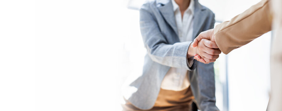 Cropped image of two businessmen handshake.Business partnership concept. 
