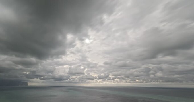 Clouds Ocean Timelapse dramatic stormy weather sweeps across the vast dark water seascape horizon.