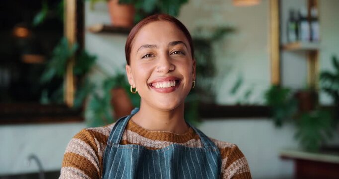 Happy, woman and face of waitress in coffee shop for confidence in hospitality career. Laugh, small business and portrait of female server with pride for customer service at cafe in Colombia.