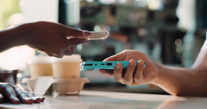 Hands, smartphone and pos with barista at cafe with easy payment, click and paperless transaction. People, server and customer experience for drinks, phone and fintech app with waiter at coffee shop