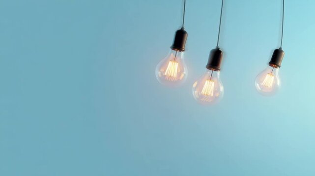 Light bulb hanging lamp on blue background with minimal design and innovation concept for creative idea and glowing filament in modern lighting and copy space for energy concept