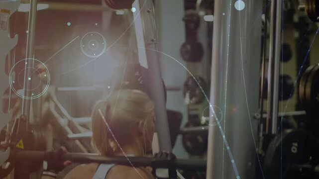 Female lifter securing grip and squatting on Smith rack, animated flares showing form for fitness