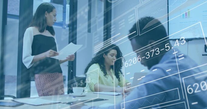 Lead starting business review, reading docs while team taking notes and HUD overlay showing charts