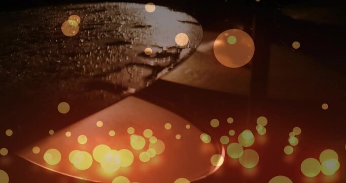 Foreground cymbal shifting after camera nudge in music studio, golden bokeh highlighting texture