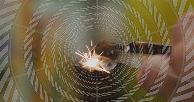 Man scraping flint wheel with finger testing tech sparks growing then fading through spiral overlay