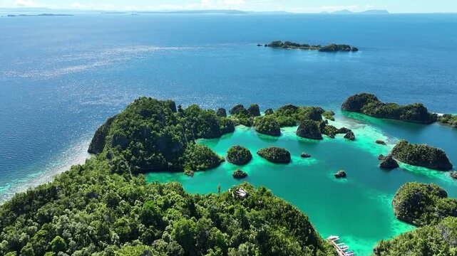 Papua; sea; sun; air; water; color; green; blue; west; forest; holiday; travel; boat; yacht; live; cloud; southwest; Pacific; New Guinea; island; Indonesia; Australia; Solomon Islands