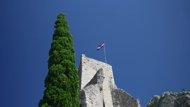 Medieval Mirabella fortress Peovica on the rocks in Omis.