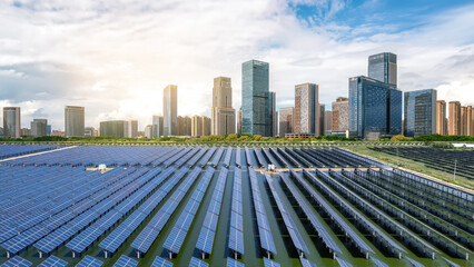 Urban Solar Power Station with Skyscrapers in Background © zhouyilu