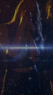 Flare appearing, star overlay, singer lifting mic, singing, engaging music fans, bandmate visible