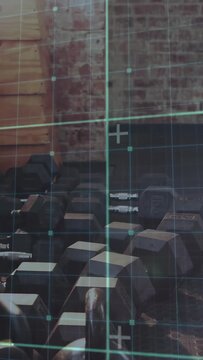 Vertical video: AR crosshair starting camera panning over weight rack and plates, centering barbell