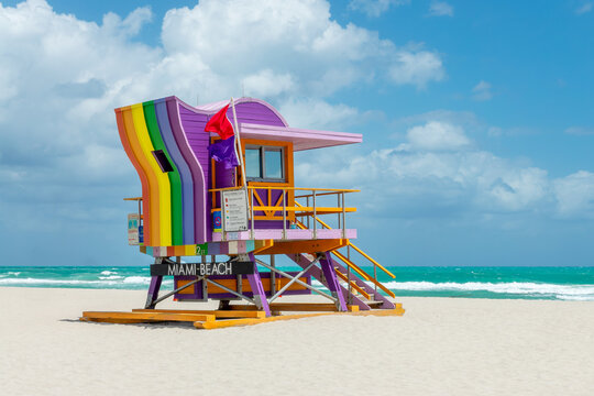 Rainbow colorful lifeguard station tower hut and the ocean in South Beach, Miami Beach, Florida