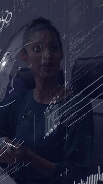 Vertical video: Woman reacting to speaker, tapping phone while tech HUD charts animating over face