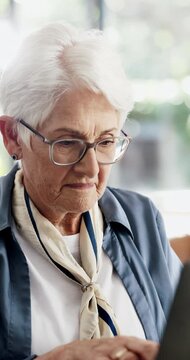 Reading, laptop and senior woman in home, pension payout application and elderly grant registration. Digital banking, pc and old person with online clearance for subsidy, typing and retirement funds
