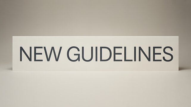 A white sign with the words 'NEW GUIDELINES' on a plain background