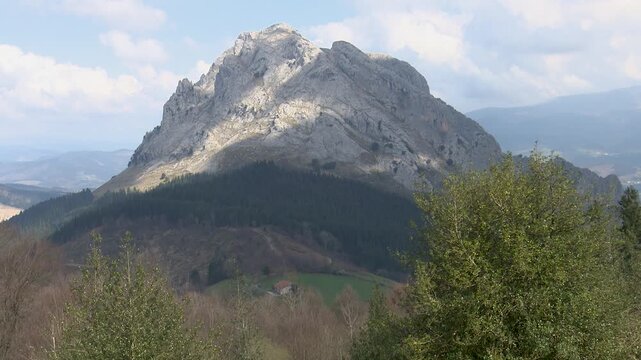 Rocky mountain landscape of Mount Anboto seen from Urkiola Natural Park in the Basque Country. Dramatic cliffs and rugged terrain associated with Basque mythology and natural heritage.