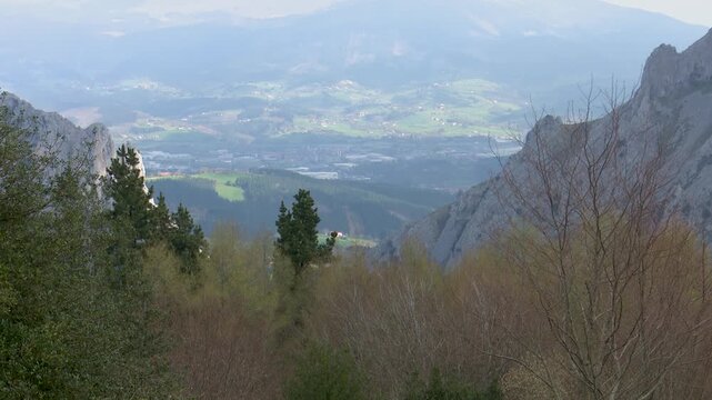 Rocky mountain landscape of Mount Anboto seen from Urkiola Natural Park in the Basque Country. Dramatic cliffs and rugged terrain associated with Basque mythology and natural heritage.