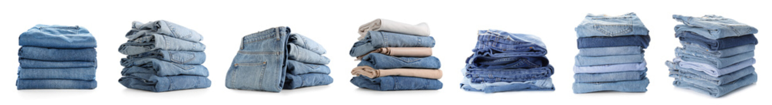 Set of stacked jeans clothes on white background