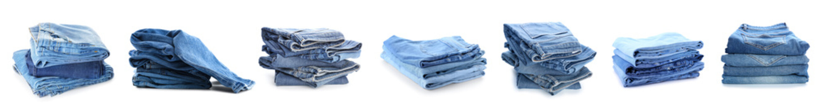 Set of stacked jeans clothes on white background