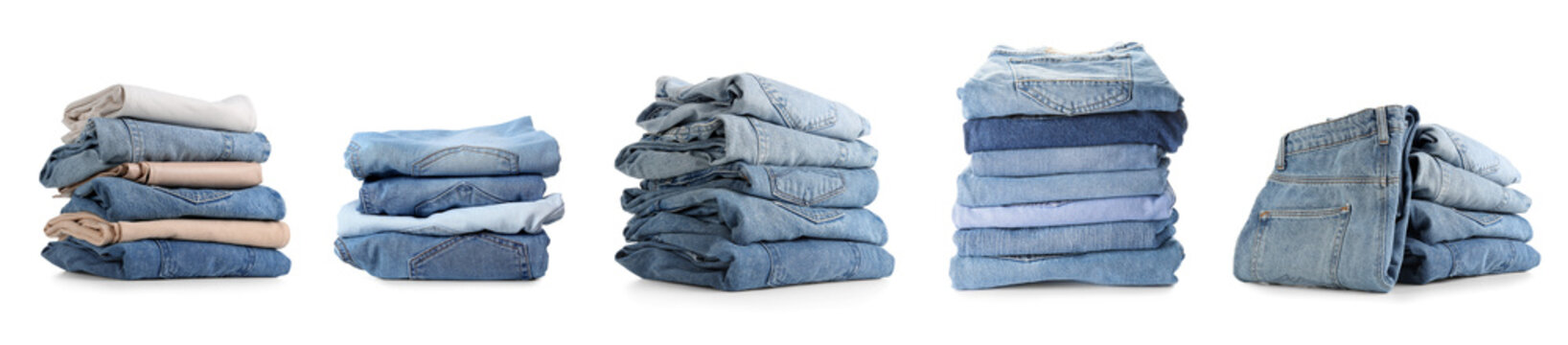 Set of stacked jeans clothes on white background
