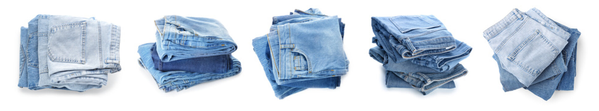 Set of stacked jeans clothes on white background