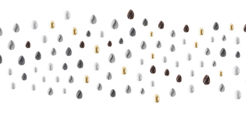 Decorative Easter eggs in various colors and designs on white background, perfect for holiday greetings, and spring them © vege