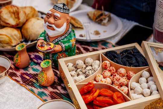 Uzbek kurt on the festive table. Milk salted cottage cheese on the holiday of Nauryz