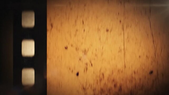Aged celluloid film tail with texture and damage. High quality 4k footage