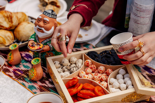 Uzbek kurt on the festive table. Milk salted cottage cheese on the holiday of Nauryz
