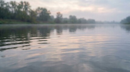 Fototapeta premium Peaceful River at Sunset with Soft Light Reflection – Natural Landscape Evening Scenery
