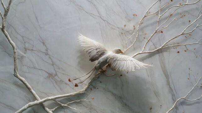 Artificial bird model with white wings on a white branch against grey background