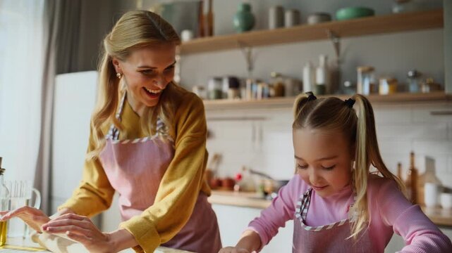 Tender family cooking cake at home closeup. Mother girl doing bakery at kitchen