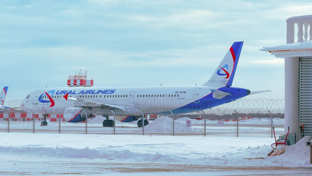 Yekaterinburg, Russia, March 11, 2026: A passenger jet of Ural Airlines Airbus A321 standing on the tarmac behind the fence of Koltsovo International Airport (SVX), Yekaterinburg, Ural. 