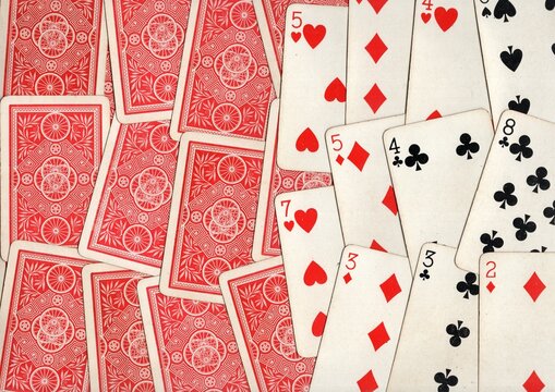 A montage of vintage playing cards on a white background.
