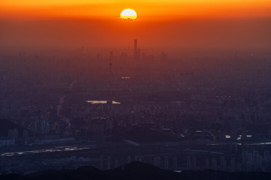 Majestic Sunrise over Beijing Cityscape: Panoramic View of CBD Skyline and China Zun from Western Hills