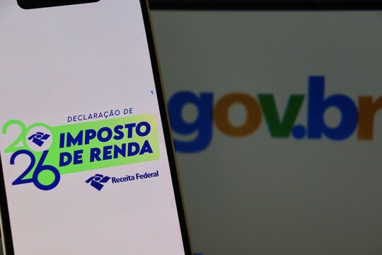 Salvador, Brazil - March 18, 2026: Logo of Brazil Income Tax Declaration 2026 (Declara&ccedil;&atilde;o do Imposto de Renda - Receita Federal) displayed with Gov.br logo in the background. 