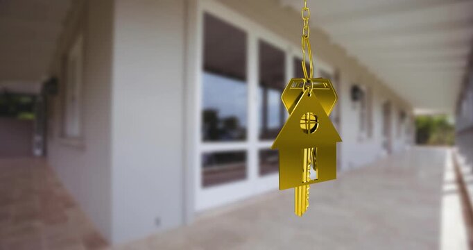 Animation of golden key with house shape over house