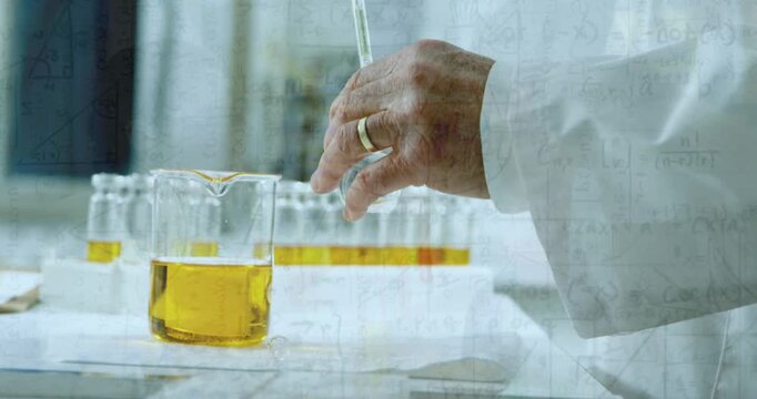 Animation of chemical formulas over hands of caucasian male lab worker