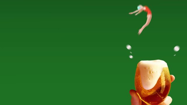Woman diving into glass of beer held in hand on green background with rich foam and texture. Concept of refreshment, casual drinking, lifestyle marketing and summer enjoyment. Banner