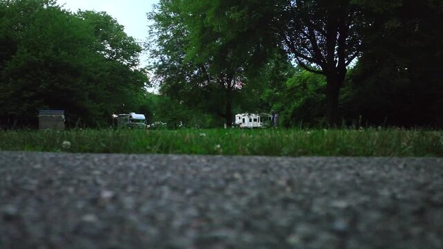Camping in Ohio state park with Rvs in campground in summer time