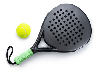 Obraz premium Black padel racket with a green grip and yellow balls for padel isolated on a white background.