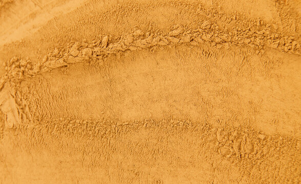 Cosmetic texture mask clay powder red. Selective focus.