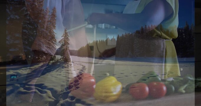 Preparing food with colorful vegetables, person in snowy landscape with trees